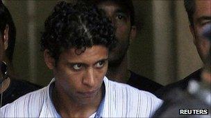 Alleged drug kingpin Antonio Francisco Bonfim Lopes escorted by police