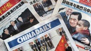 File image of the front pages of Chinese newspapers in January 2011