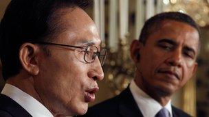 US President Barack Obama listens as South Korean President Lee Myung-back speaks in Washington on 13 October 2011