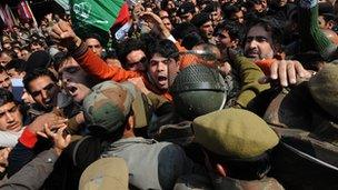 Activists from the Peoples Democratic Party protest against the alleged corruption in the state government in Srinagar