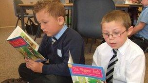 Primary pupils reading books