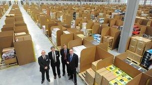 Alex Salmond joined Amazon's vice president of European operations Allan Lyall and Fife Council leader Peter Grant