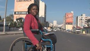 Mariana Tembe crossing the road in Maputo