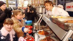 Jamie Oliver feeds children