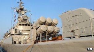 A Chinese frigate sits berthed in Shanghai on September 22, 2011.