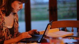 Woman working on a laptop