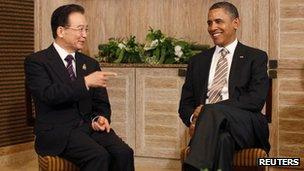 US President Barack Obama (R) meets with China's Premier Wen Jiabao on the sidelines of the East Asia Summit in Nusa Dua, Bali, 19 November 2011