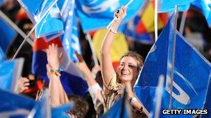 Supporters of the centre-right Popular Party celebrate following their victory in the 2011 Spanish general election