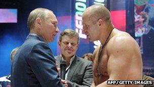 Russian Prime Minister Vladimir Putin and fighter Emelianenko