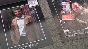 Posters of Ahmet Sik and Nedim Sener