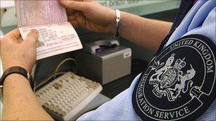 A passport being checked at an airport