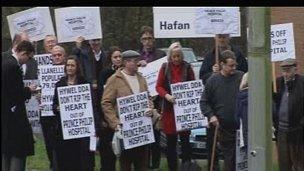 Protesters outside health board meeting