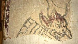 Medieval wall painting of Sloth at St Cadoc's Church, Llancarfan