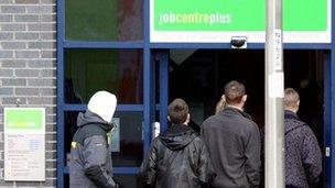 Young men enter a Job Centre