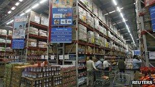 Customers shop at a Best Price Modern Wholesale store, a joint venture of Wal-Mart Stores Inc and Bharti Enterprises in Punjab