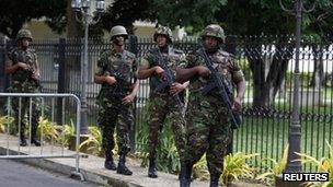 Soldiers patrol the prime minister's rsidence on 25 November