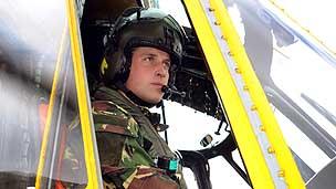 Prince William in his helicopter