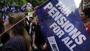 protestor carrying "fair pensions for all" flag