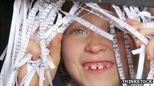 Child with shredded paper