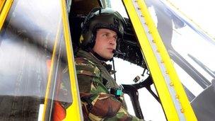 Prince William at the controls of a Sea King helicopter