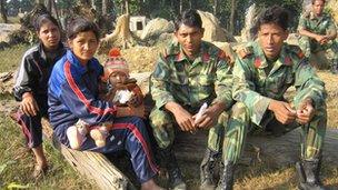 Maoist fighters and their families