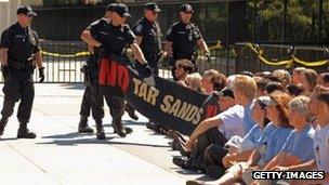 Protester and police