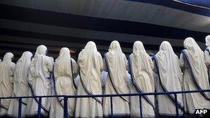 Nuns belonging to the order of the Missionaries of Charity take part in the mass of Birth Centenary Closing Eucharistic Celebration in Kolkata on September 4, 2011.