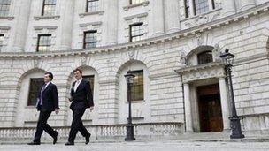 Britain's Chancellor of the Exchequer George Osborne (L) leaves the Treasury with the Chief Secretary to the Treasury Danny Alexander in central London November 29, 2011.