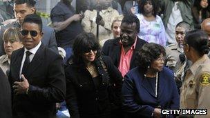 Members of Michael Jackson's family leave the Los Angeles courthouse where Jackson's physician Conrad Murray was sentenced 29 November 2011