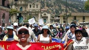 Protesters march during a strike against Newmont's Conga gold mine in Cajamarca 25 November 2011