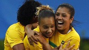 Brazilian women footballers celebrate goal