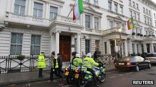 Police officers are deployed outside the Iranian Embassy in central London, 30 November 2011