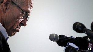 Attorney Jeff Anderson looks down as he reads a statement from his client during a news conference 30 November 2011