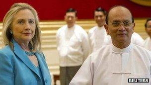 Secretary of State Hillary Clinton (L) shakes hands with President Thein Sein during a meeting at the President's Office in Nay Pyi Taw December 1