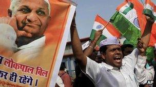 Supporters of Indian rights activist Anna Hazare shout slogans during a rally in support of Mr Hazare's fight against corruption, in Mumbai, Aug 2011