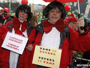 Protesters dressed as Elio Di Rupo demonstrate in Brussels, 2 December