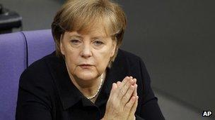 German Chancellor Angela Merkel attends a meeting of the Bundestag on 2 December