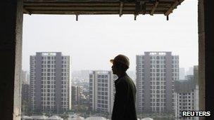 File image of construction worker in Shanghai