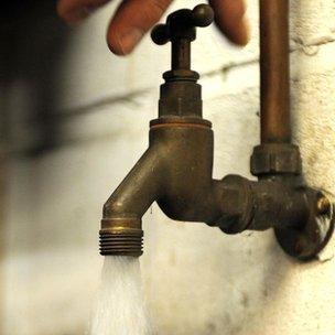 Water pouring from tap