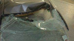 Damaged roof and windscreen of Nissan Ntec