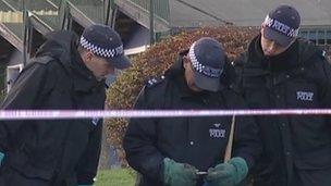 Police at the scene of the murder