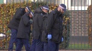 Police at the scene of the murder