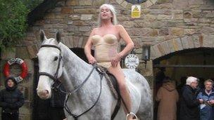 Man dressed as Lady Godiva