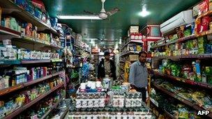 Indian customers browse the shelves inside a departmental store in New Delhi