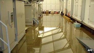 Radioactive water on the floor of a water treatment facility at the Fukushima Daiichi nuclear plant on 4 December 2011