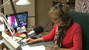 Judi Spiers taking listener pledges in the 12-hour on-air auction at BBC Radio Devon