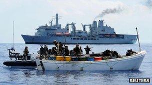 A Royal marines team boarding a suspected pirate vessel in the Indian Ocean on 28 November 2011.