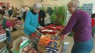Salvation Army volunteers packing food parcels in Reading