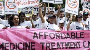 HIV/AIDS patients and members of Non-Governmental Organizations shout anti-government slogans during a march in New Delhi, 10 May 2006.