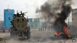African Union troops at the scene of a suicide bombing in Mogadishu (6 December)